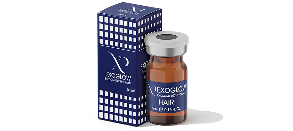 EXOGLOW HAIR – braunes Fläschchen mit silbernem Deckel, blaue Produktverpackung im Hintergrund